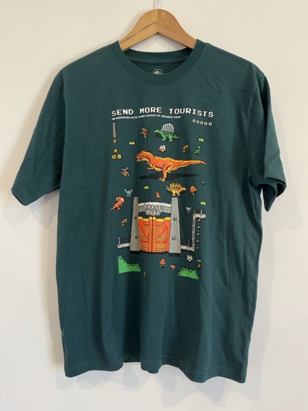 Jurassic Park Send More Tourists 8-Bit Tee Green M